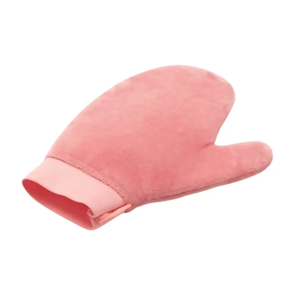 Side view of pink Self Tanning Glove DC-BM115 showing soft velvet fabric, ergonomic thumb design, and elastic cuff